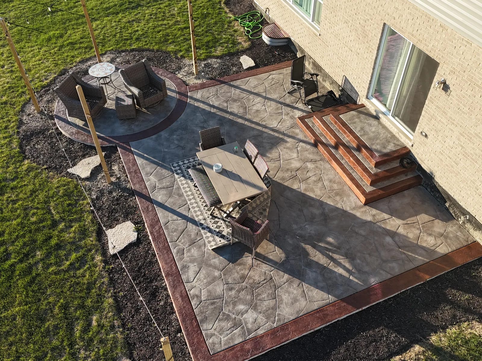 Stamped concrete patio project by MPS Concrete & Design